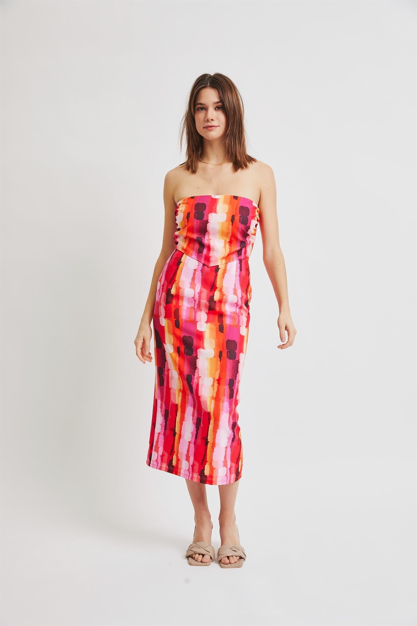 SMOCKED BACK TUBE TOP AND ATTACHED POCKET MIDI SKIRT