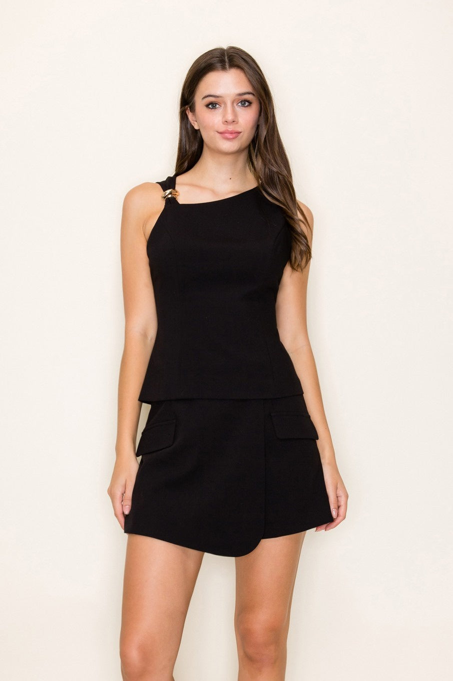 Sleeveless Knotted Top with Golden Applique – Elegant Black Evening Blouse